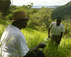 Dr Mwanika and Pilgrim Africa Education Director Sam Ocen on the way up the mountain