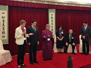 +Katharine praying for President Ma with Bp Lai